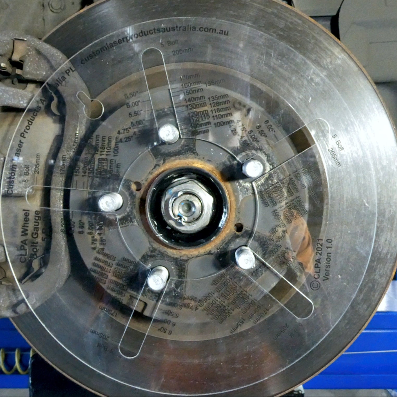 5 Stud Wheel Bolt Pattern Gauge in use — wheel bolt pattern gauge